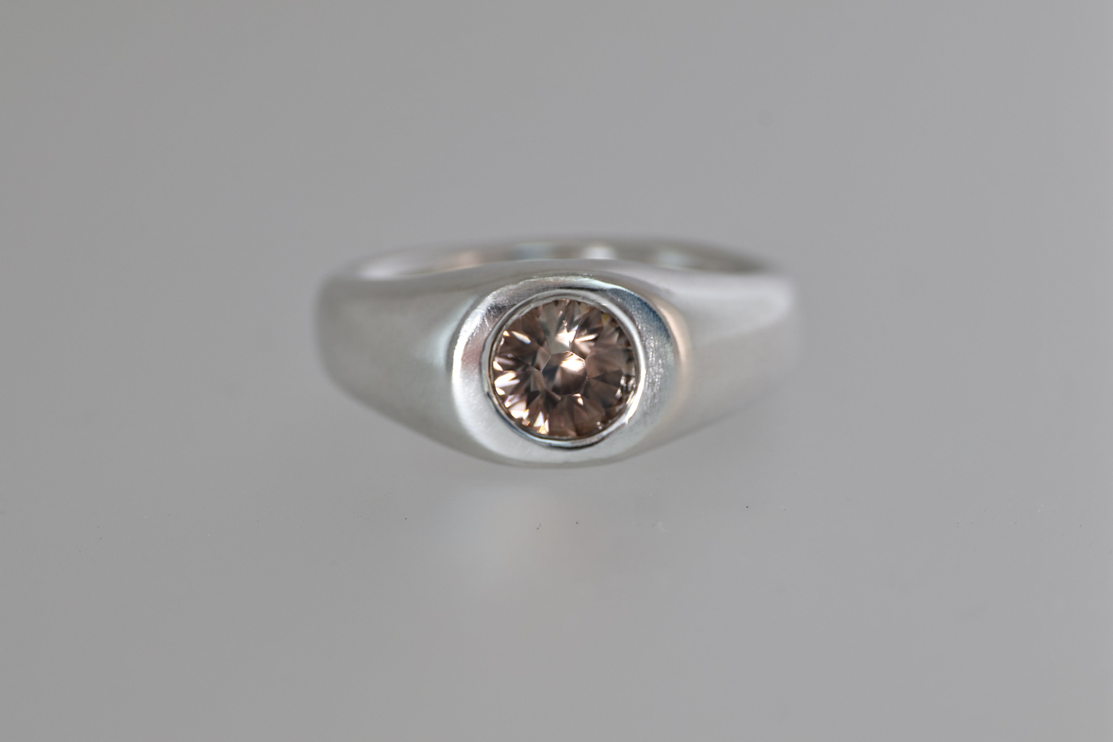 Thick Brushed Silver Band w/ Blue Montana Sapphire