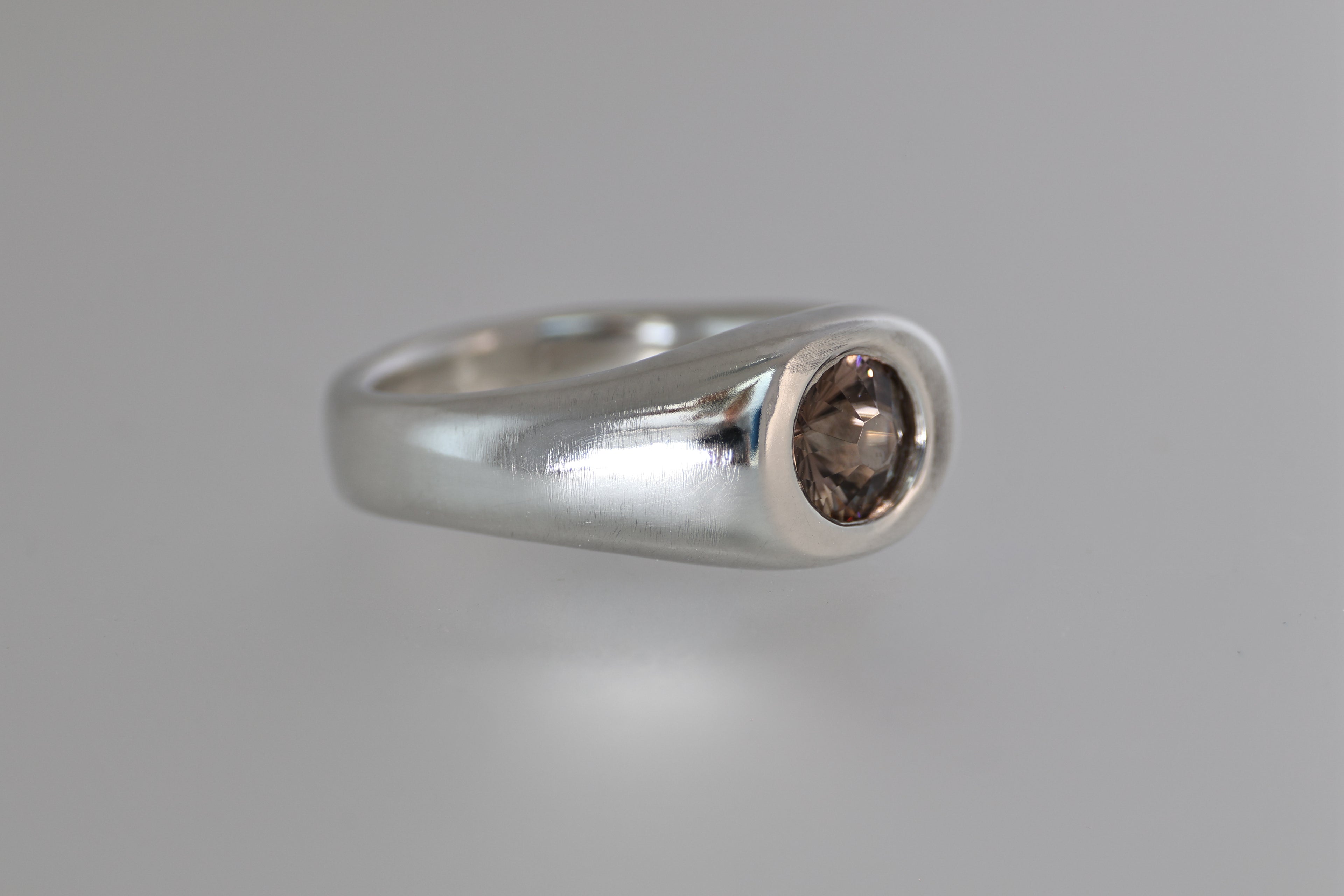 Thick Brushed Silver Band w/ Blue Montana Sapphire