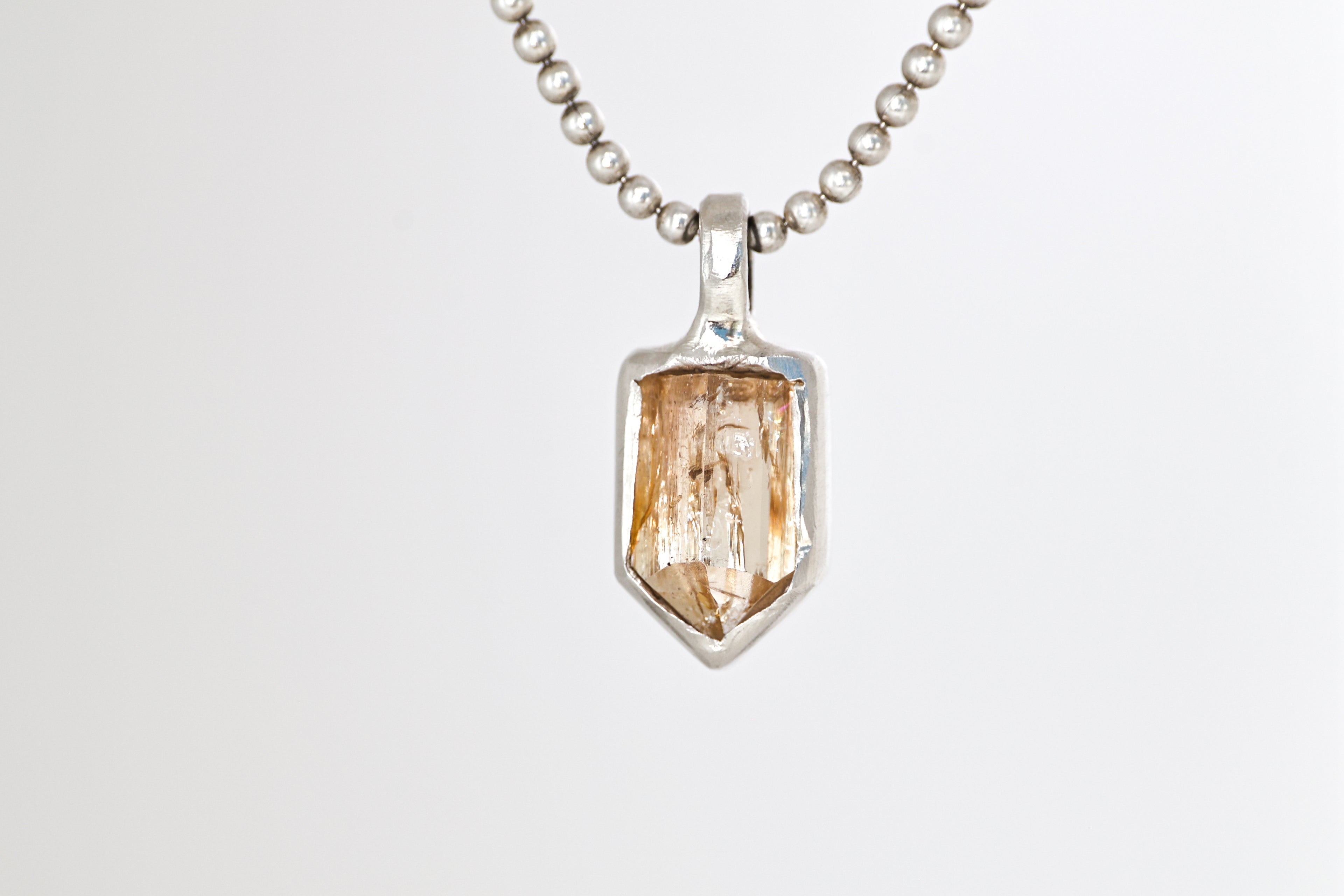Imperial Topaz Crystal Encased in Silver Mini Pendant
