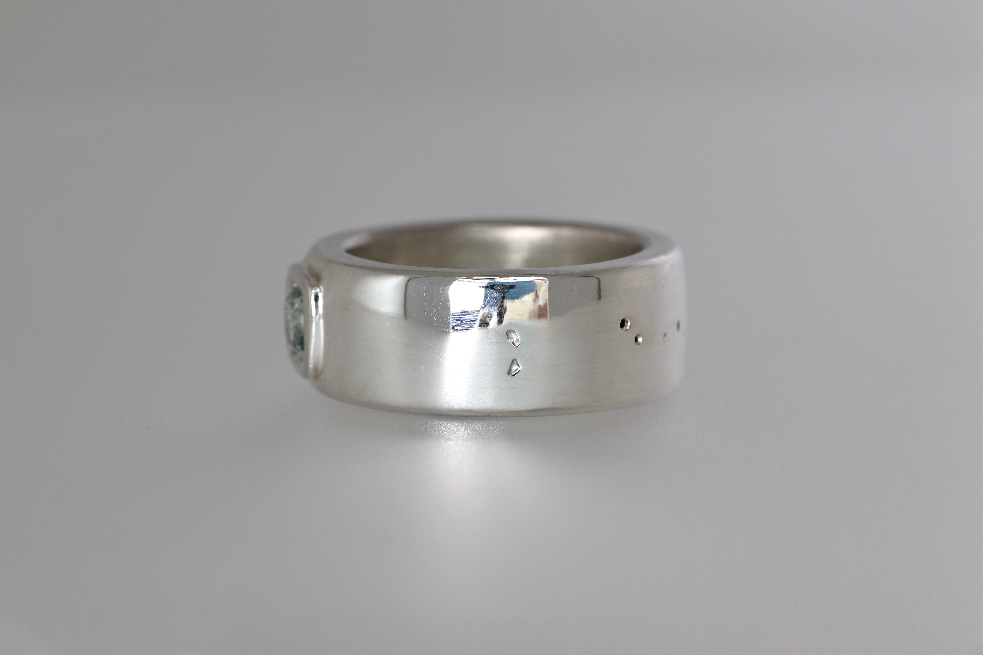 Thick Silver Band w/ Light Blue Montana Sapphire Cushion