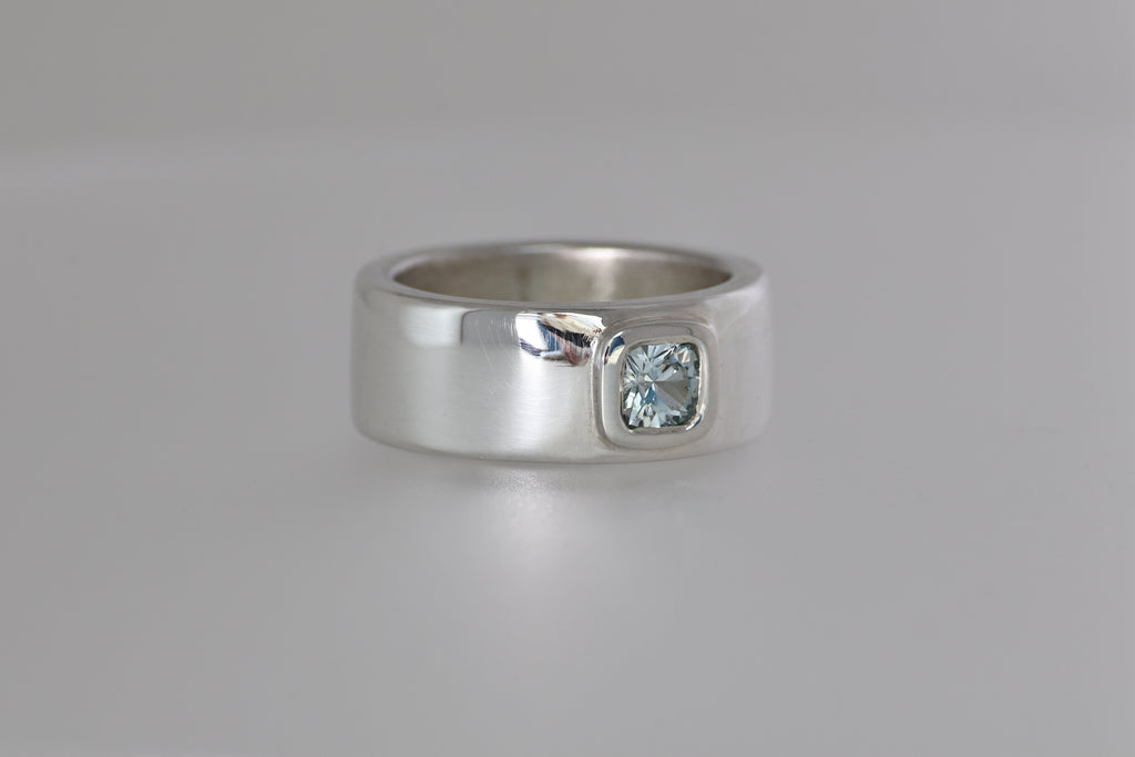 Thick Silver Band w/ Light Blue Montana Sapphire Cushion