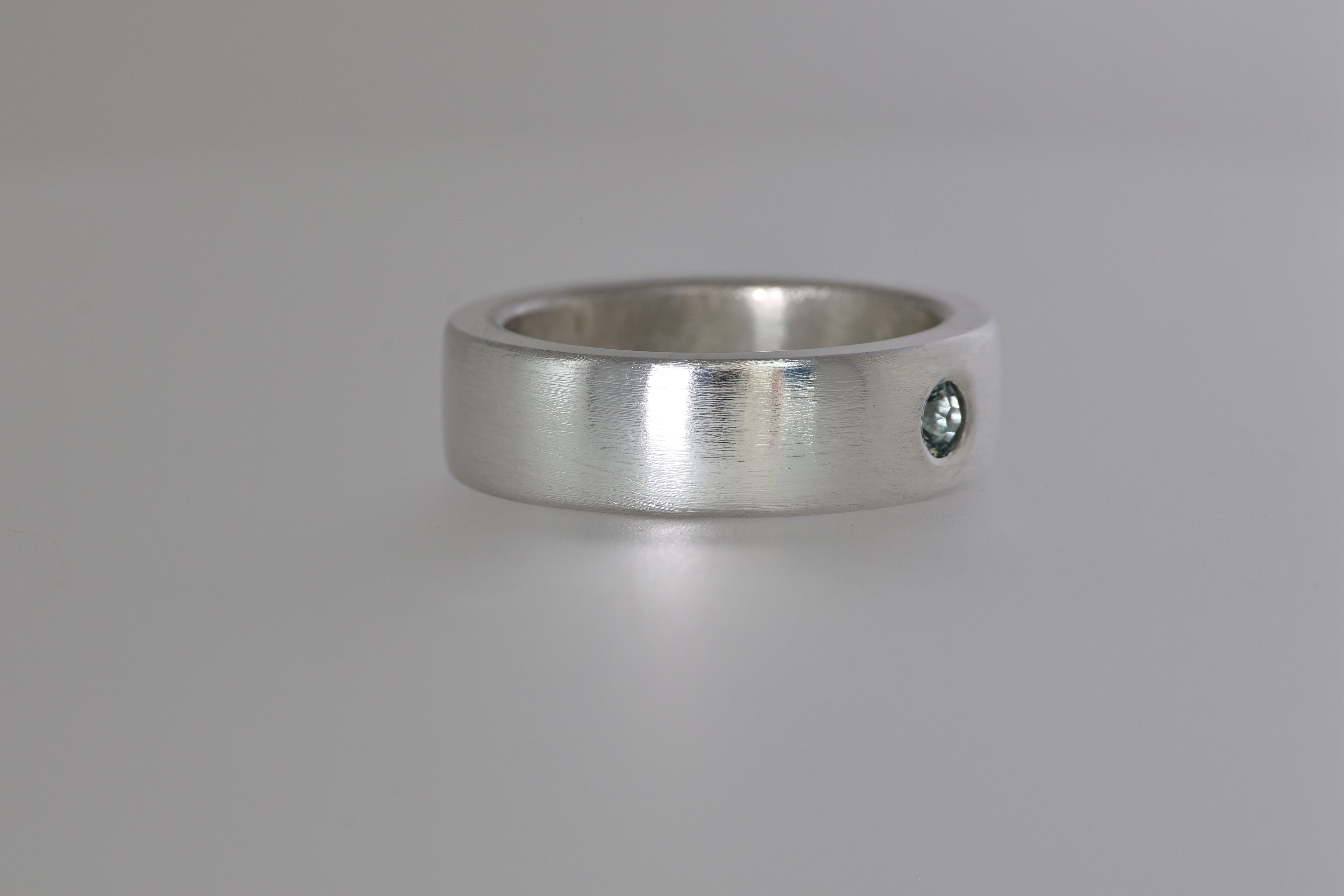 Thick Brushed Silver Band w/ Blue Green Montana Sapphire
