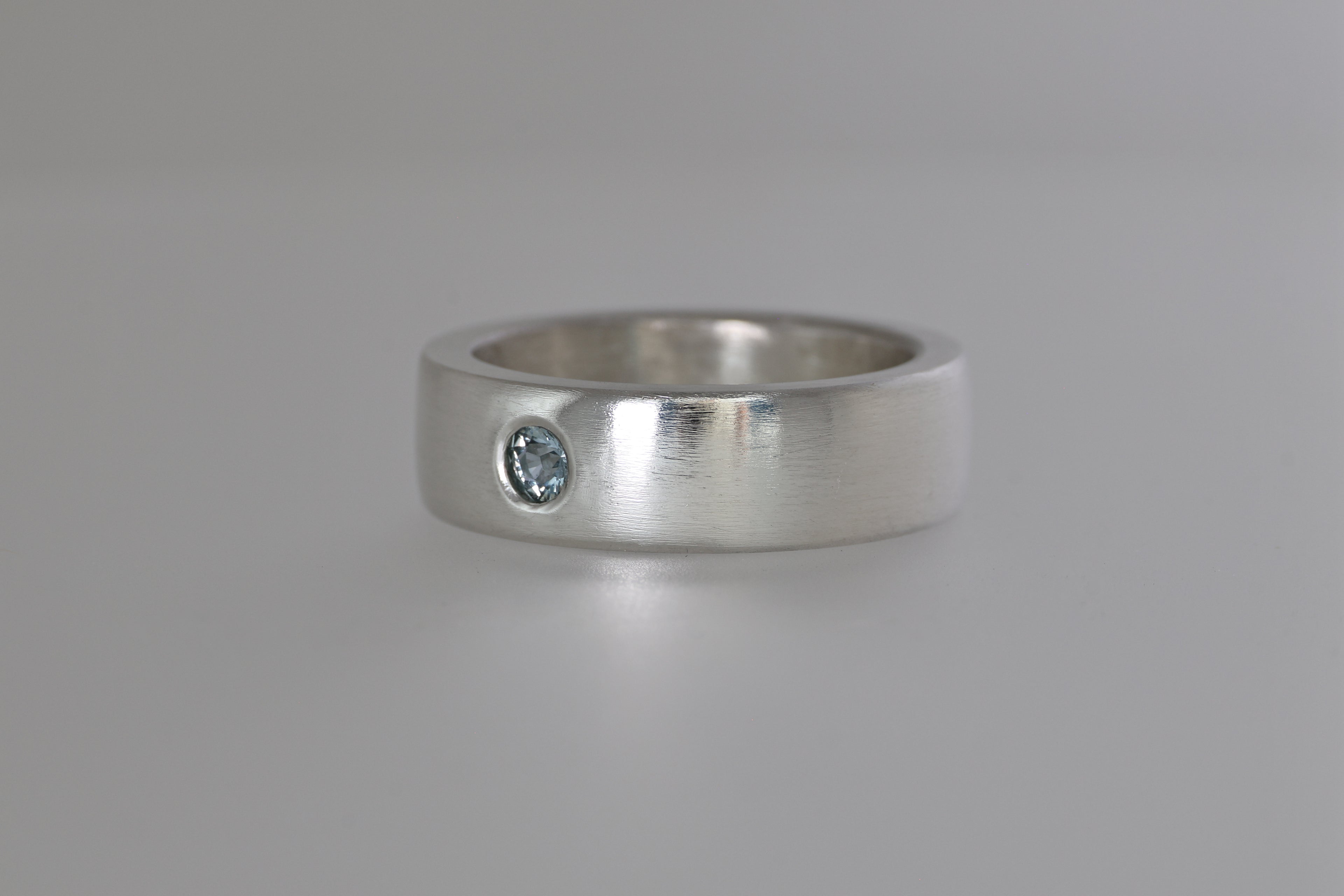 Thick Brushed Silver Band w/ Blue Green Montana Sapphire
