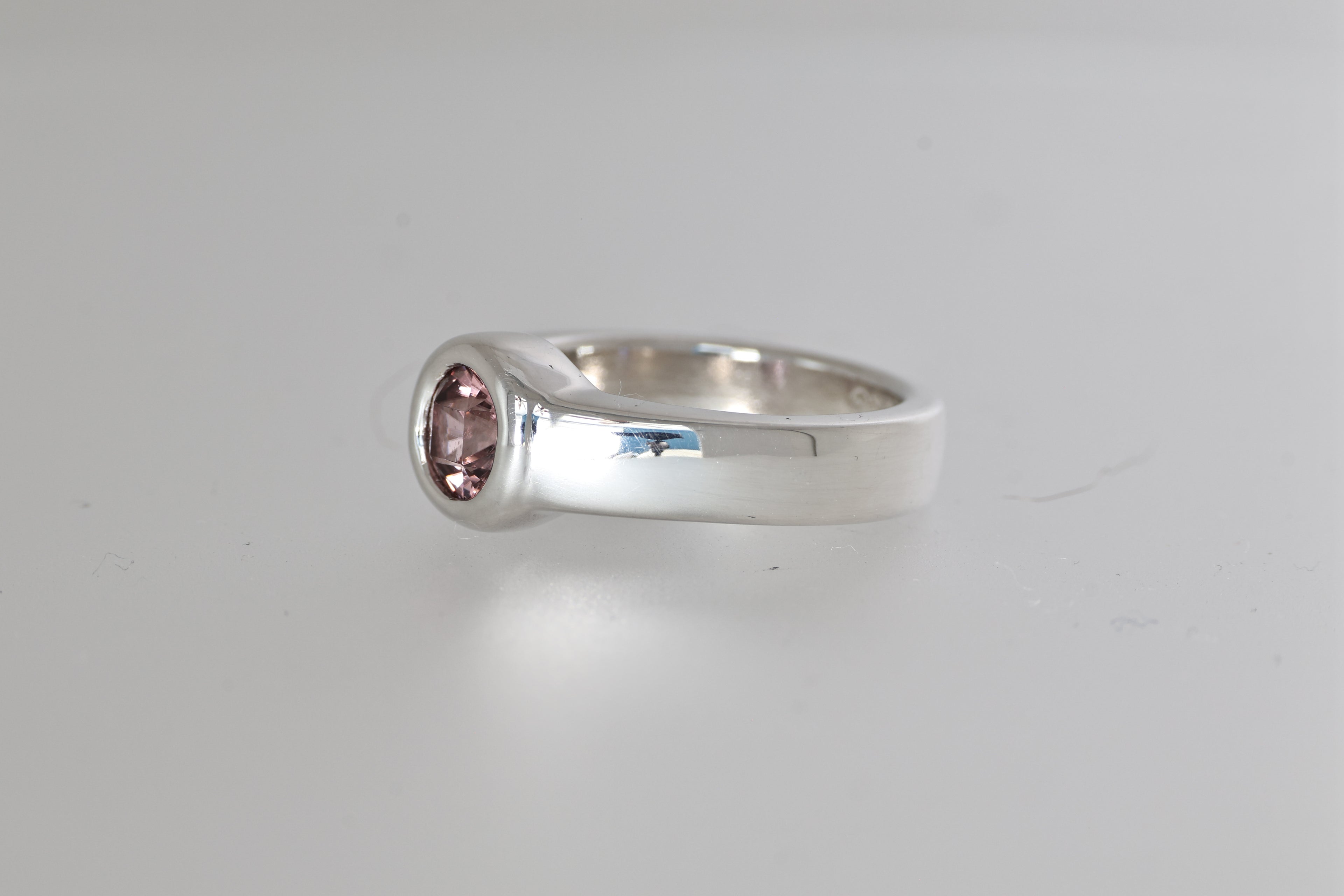Silver Bezel-set Gemstone Ring w/ Round Mozambique Zircon