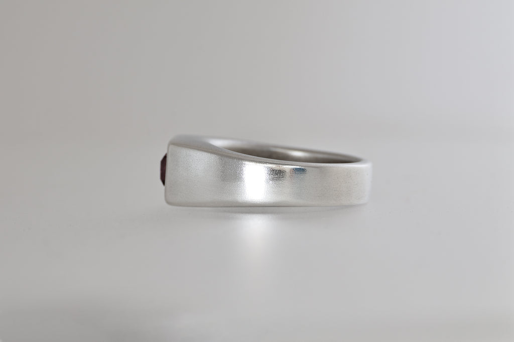 Brushed sterling silver signet ring with lavender Mozambique zircon emerald cut
