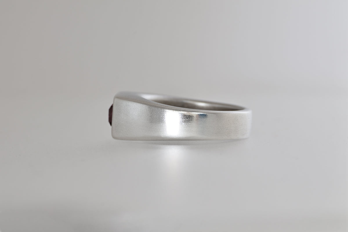Brushed sterling silver signet ring with lavender Mozambique zircon emerald cut