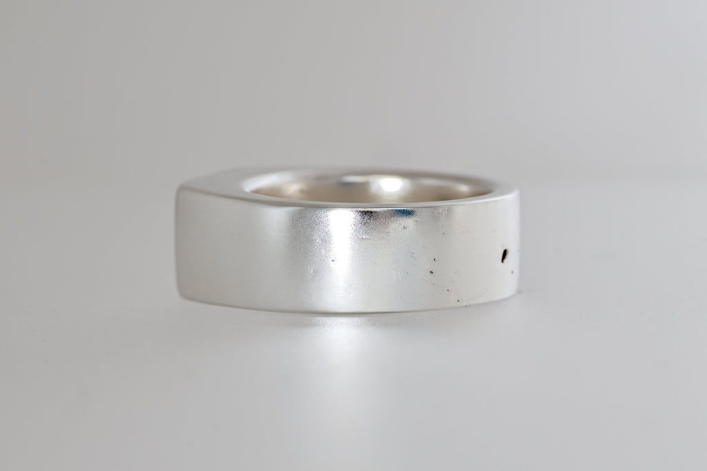Brushed sterling silver signet ring with mauve pink Mozambique zircon cushion