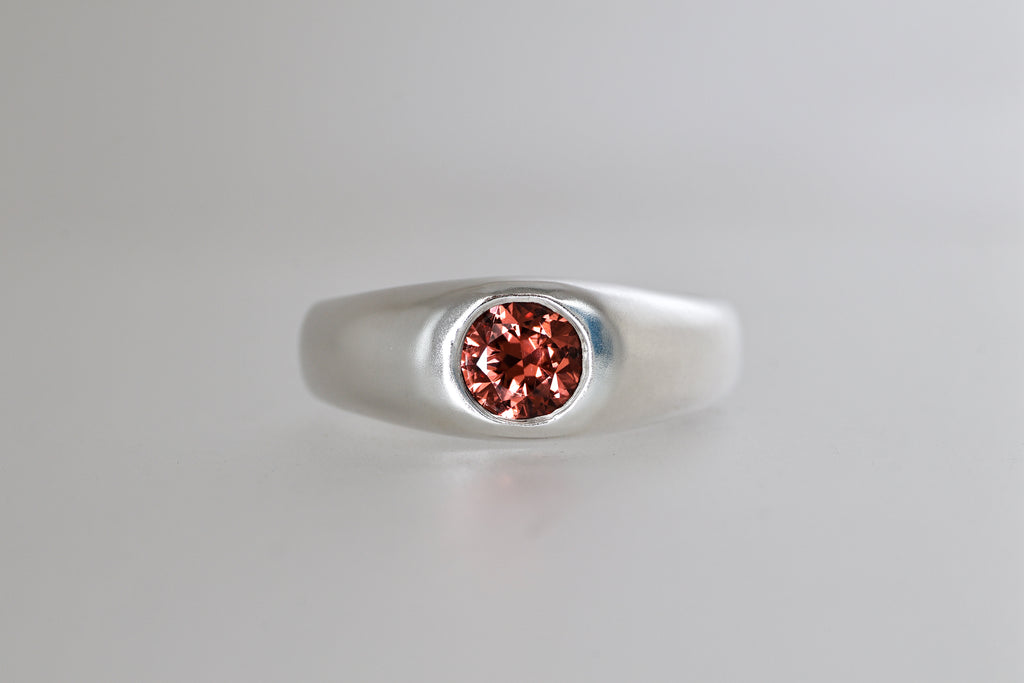 Brushed sterling silver signet ring with red-orange Malaya garnet, view 7