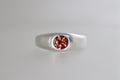 Brushed sterling silver signet ring with red-orange Malaya garnet, view 7