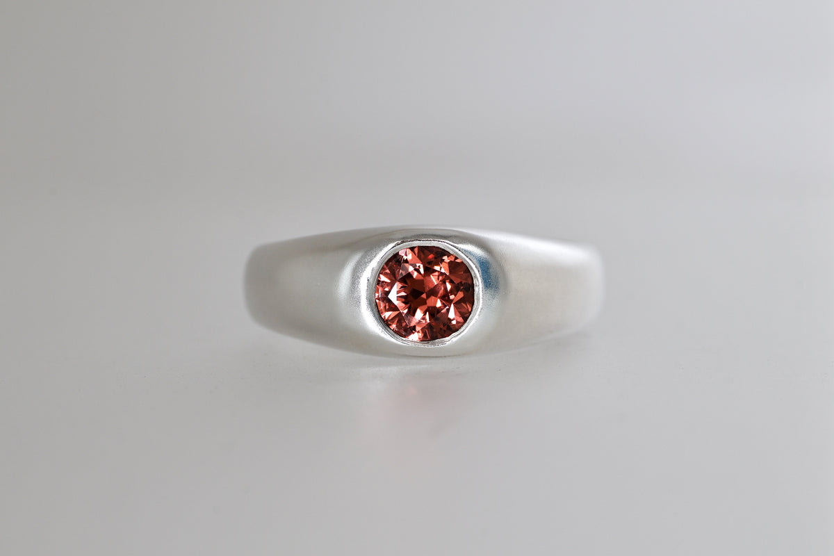 Brushed sterling silver signet ring with red-orange Malaya garnet, view 7
