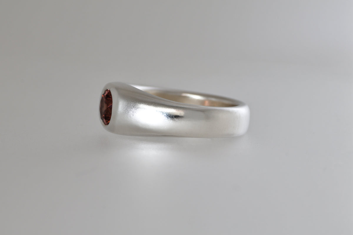 Brushed sterling silver signet ring with red-orange Malaya garnet, view 3